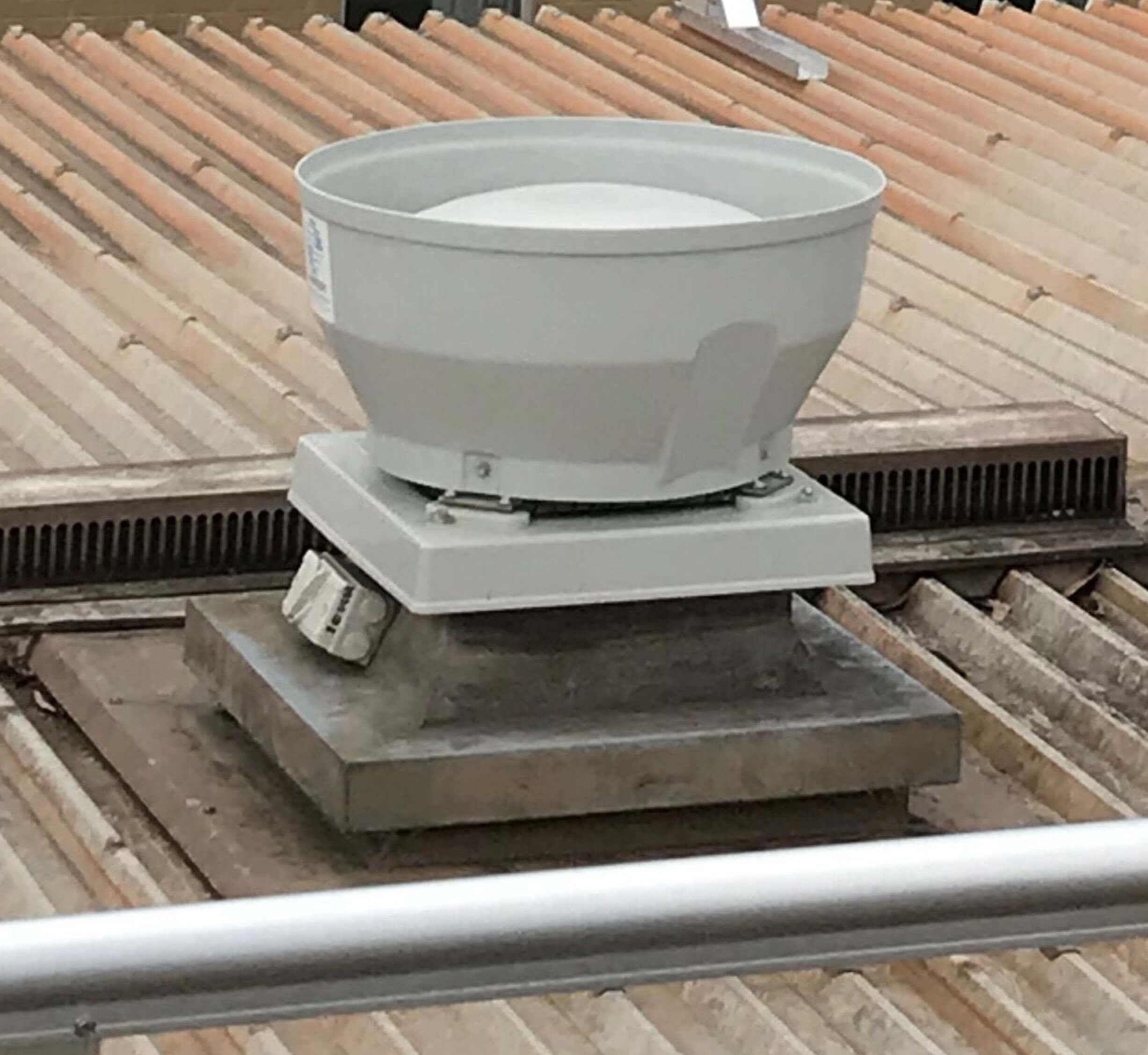 A white bowl placed on a rooftop