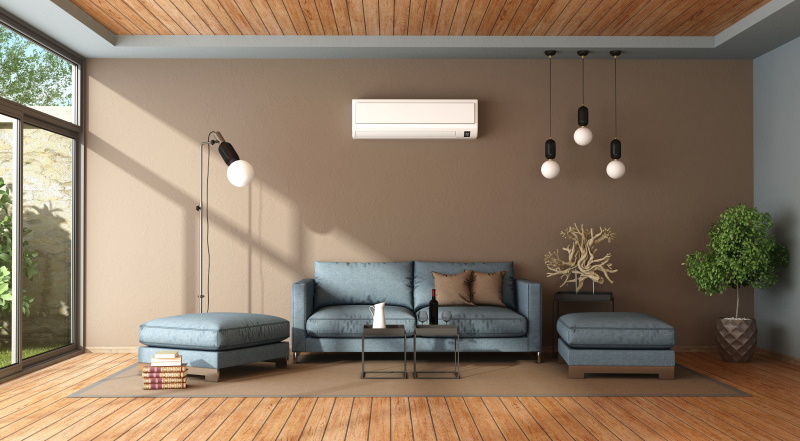 blue and brown living room with air conditioner