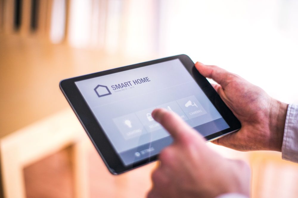 A man interacts with a tablet